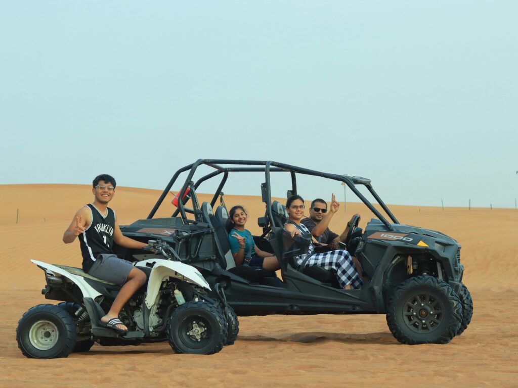 Thrilling quad bike ride in Dubai desert with golden dunes and expert-guided off-road adventure.
