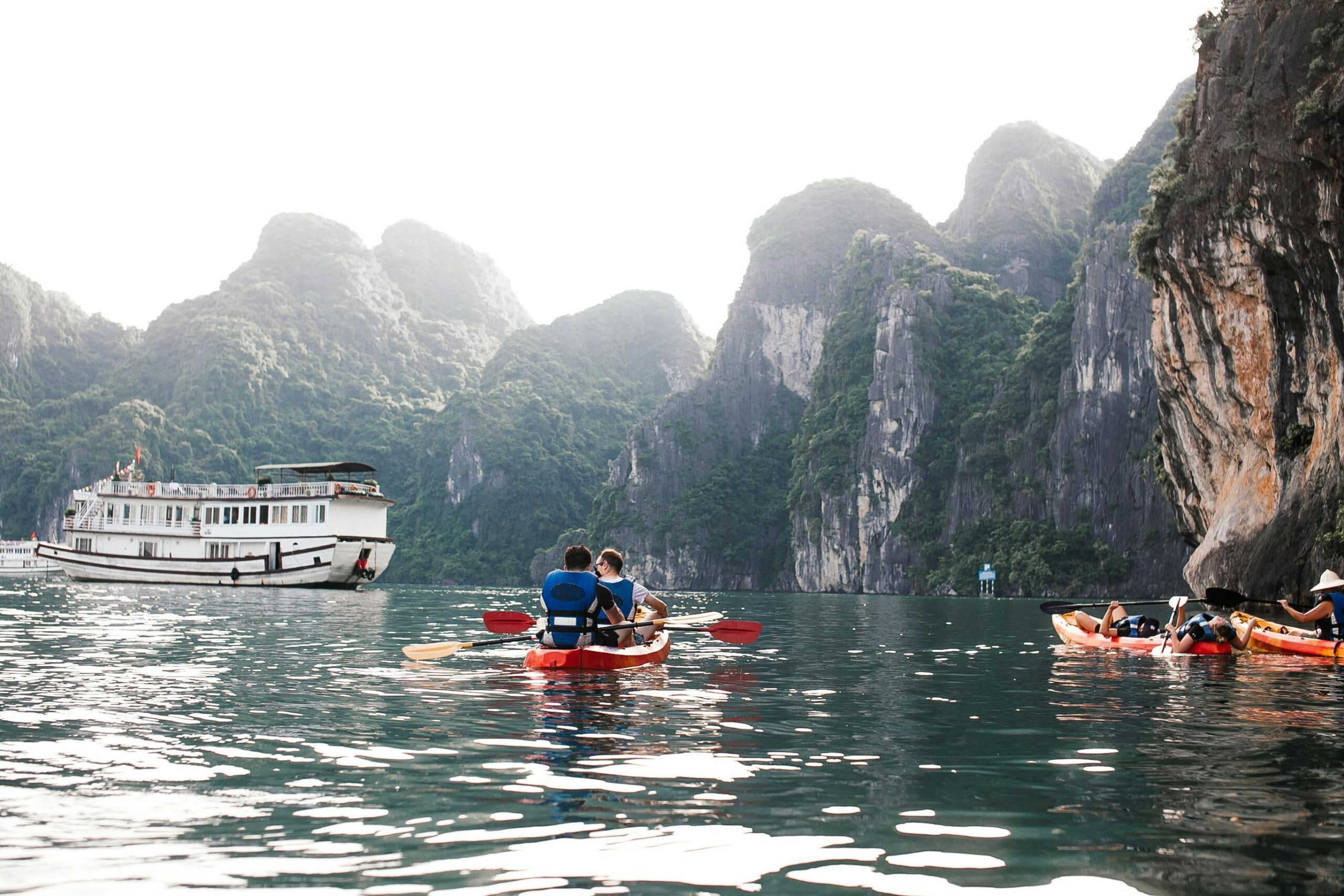 Private Khor Fakkan coastal tour with kayak adventure along scenic waters and mountain views.