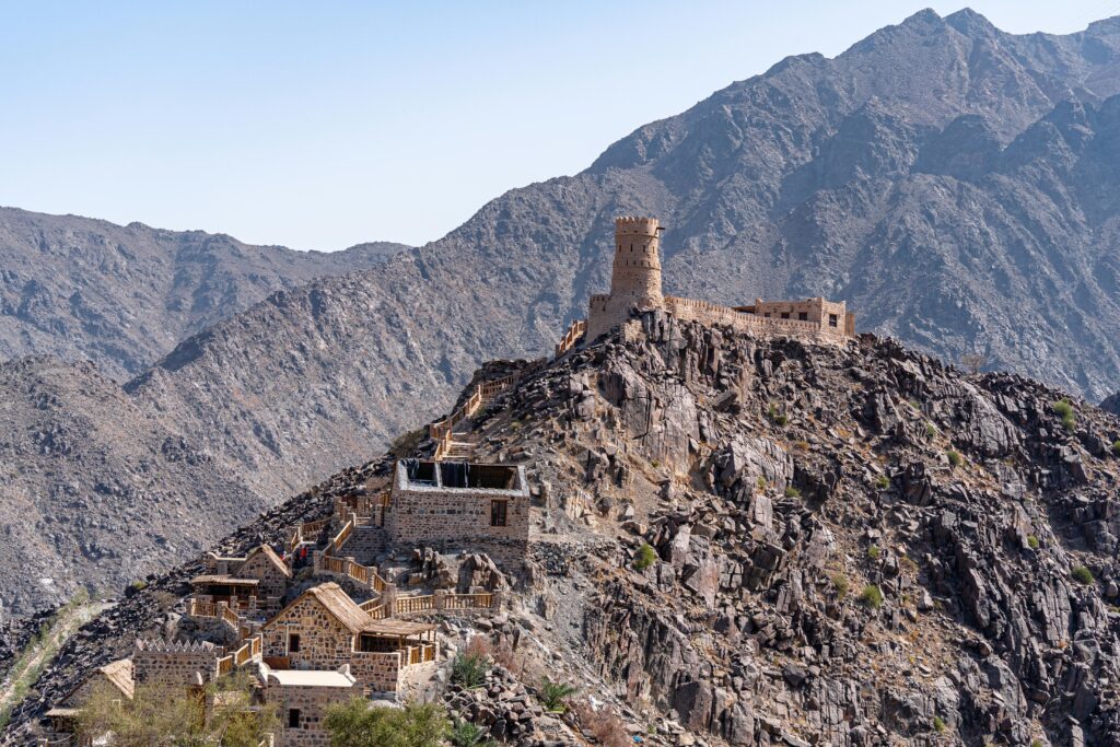 Ghost Village Safari with Dune Bashing & Sandboarding