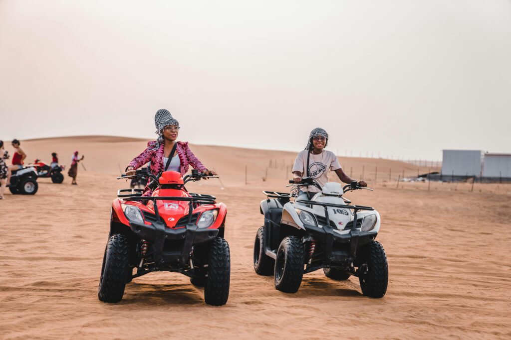 VIP Desert Safari experience with dune bashing, sandboarding, and quad bike adventure in Dubai desert.