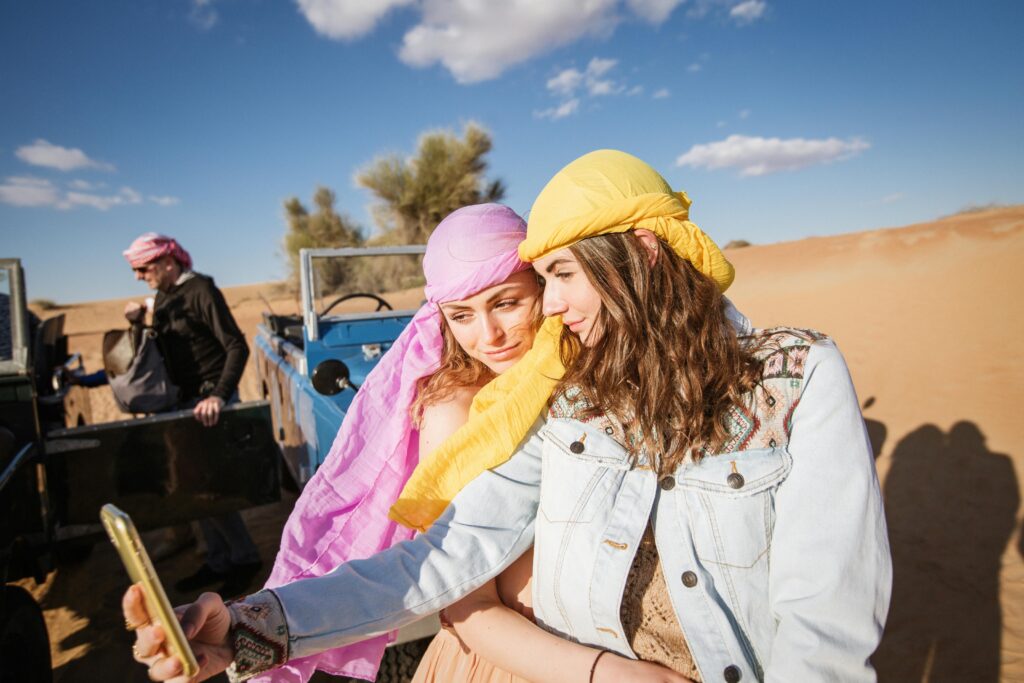 Private desert safari in Dubai featuring a luxury 4x4 vehicle navigating golden sand dunes.